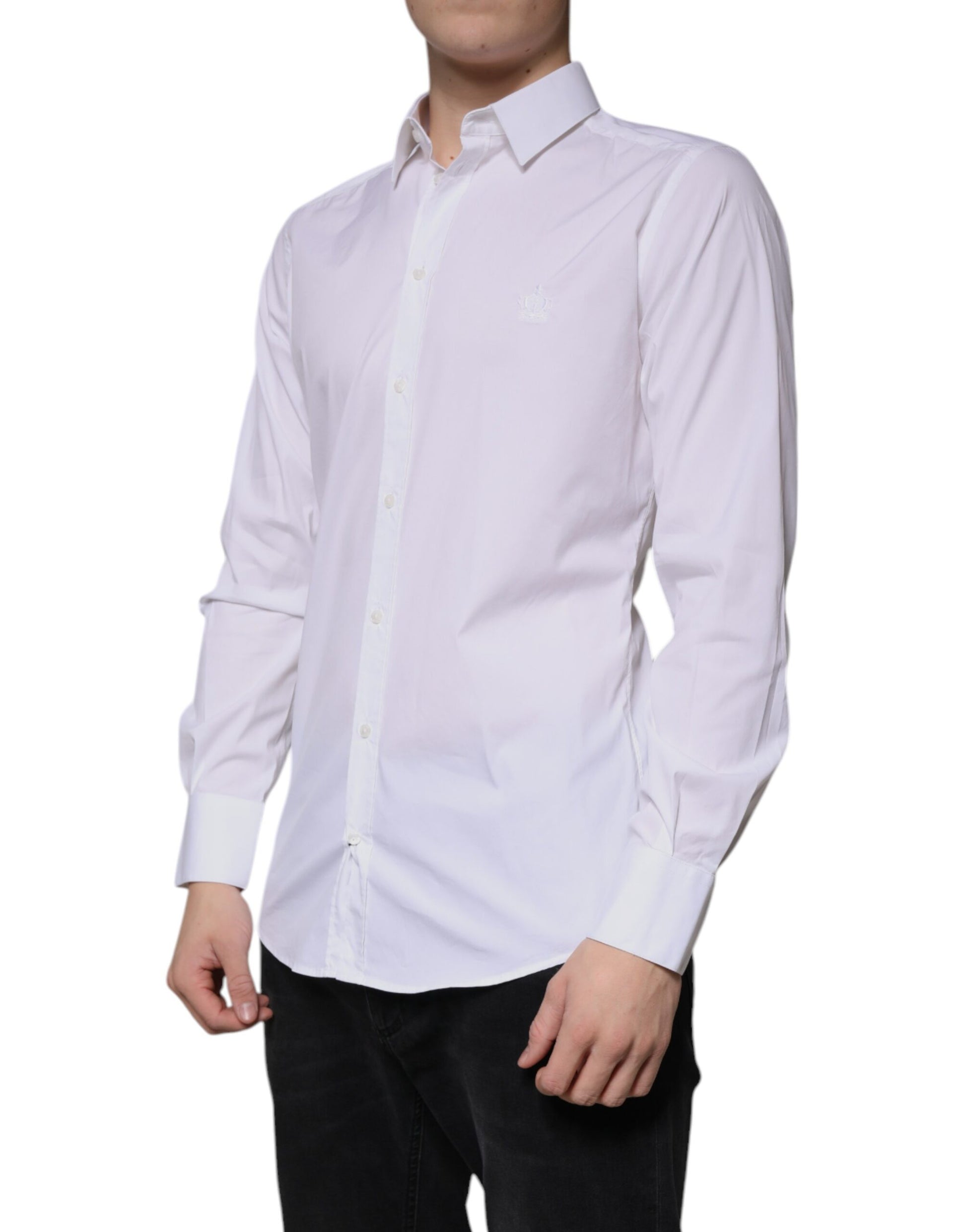 A long sleeved white cotton dress shirt with a collar and button-up front