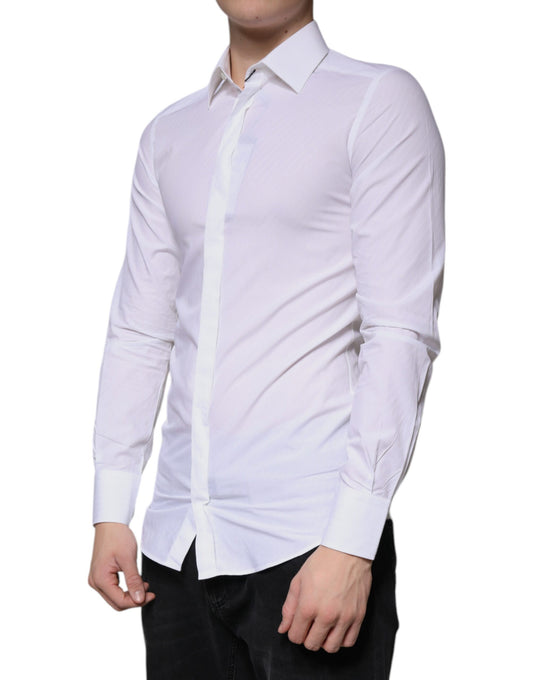 A mannequin wearing a white cotton long sleeve dress shirt
