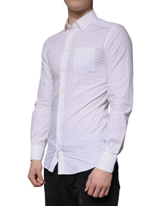 A long sleeved white cotton dress shirt with a collar and cuffs