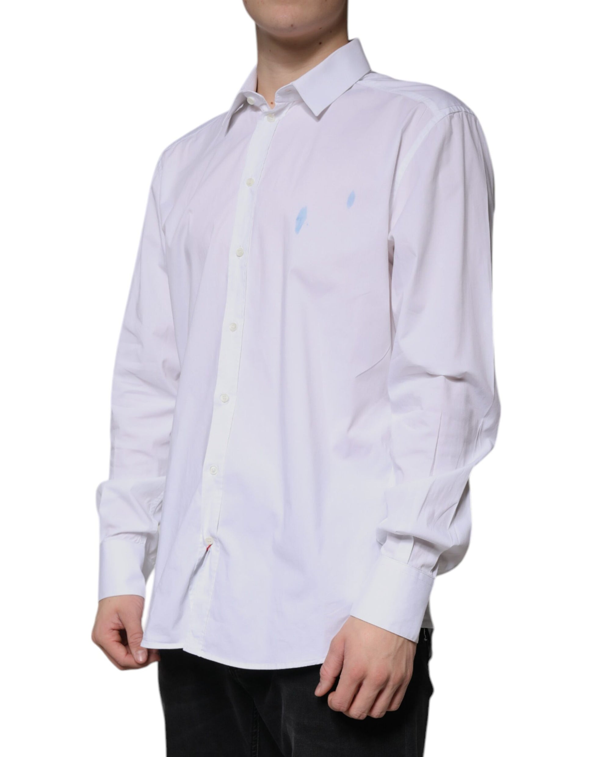 A white cotton long sleeve dress shirt with gold detailing