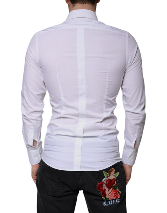 A long sleeved white dress shirt with a gold design on the back, featuring a rose embroidery