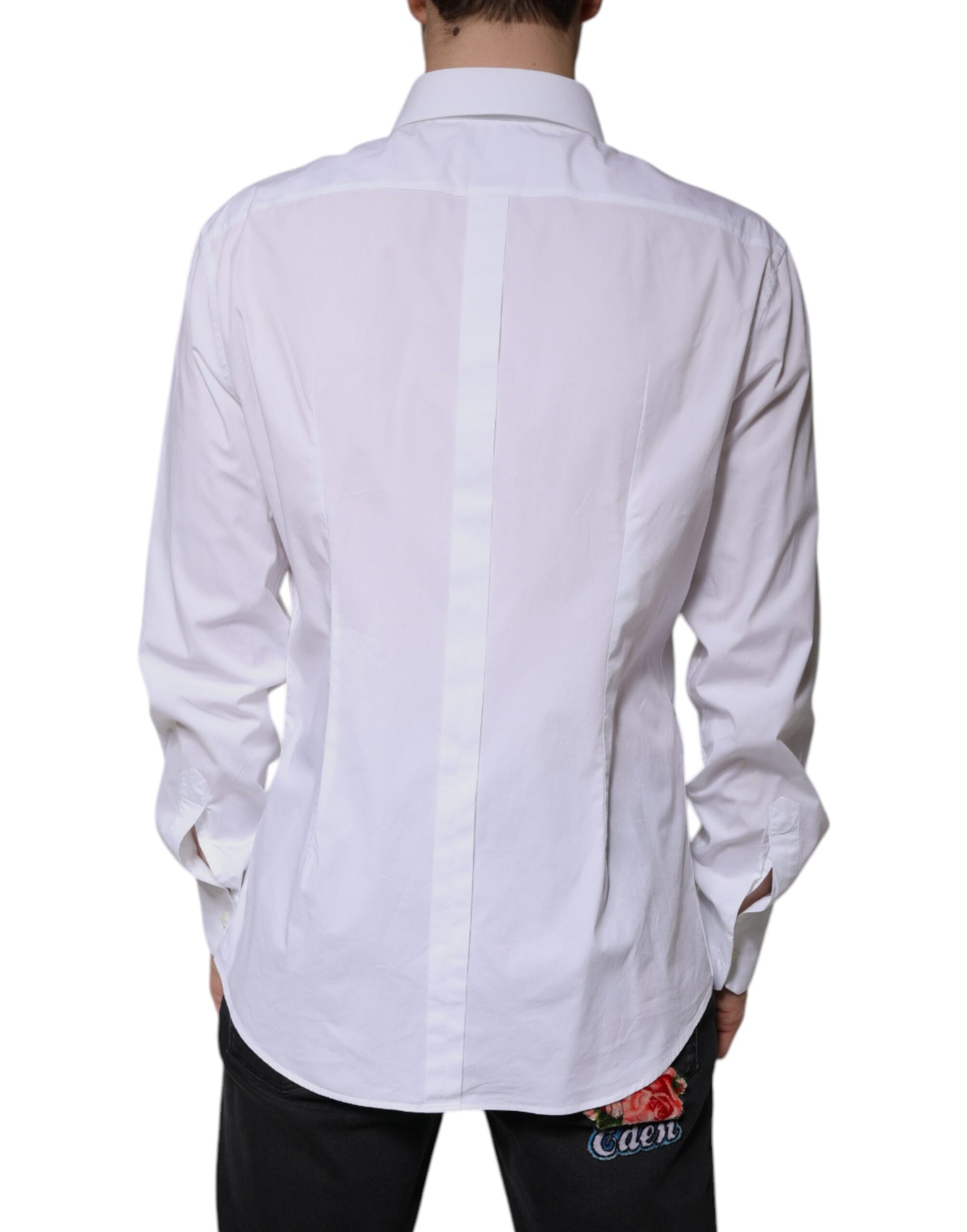 A white cotton long sleeve dress shirt with a gold design on the back