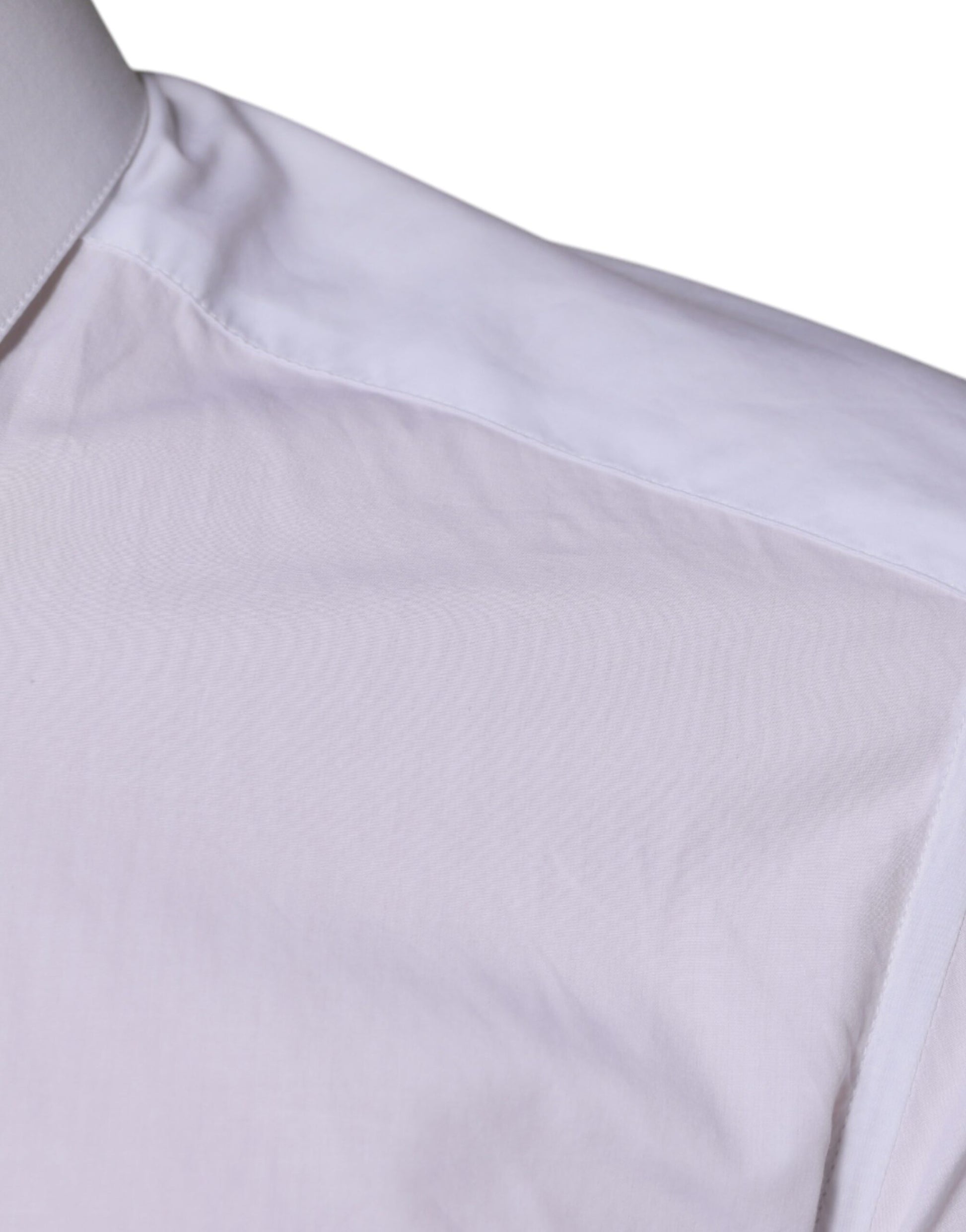 A long sleeve men's shirt with a white cotton base and gold accents