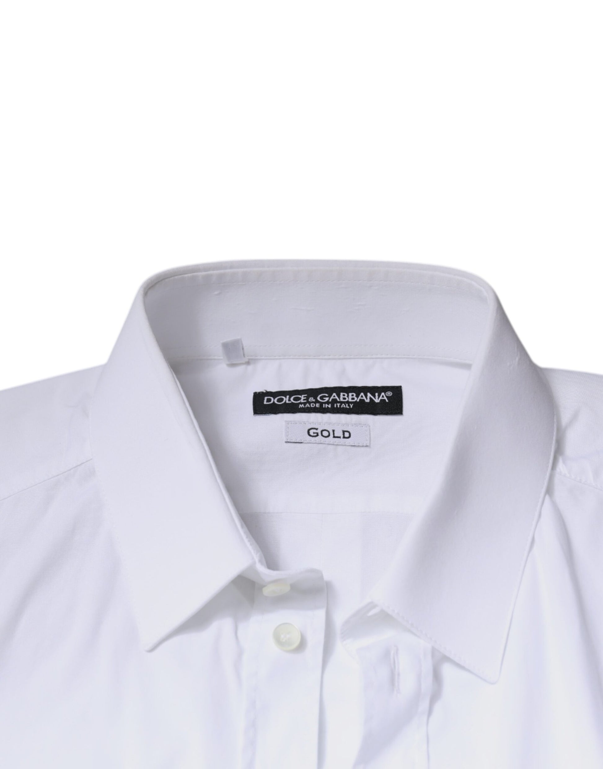 A white cotton long sleeve dress shirt with a gold label on the collar