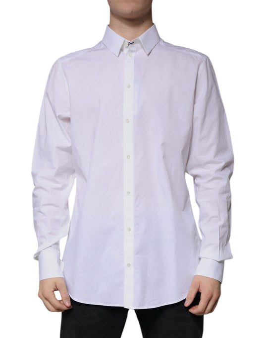 A long sleeved white cotton dress shirt with a collar and button-down front