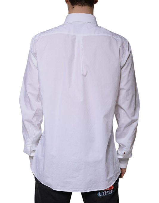 A long sleeved white cotton dress shirt with a collar and button-down front