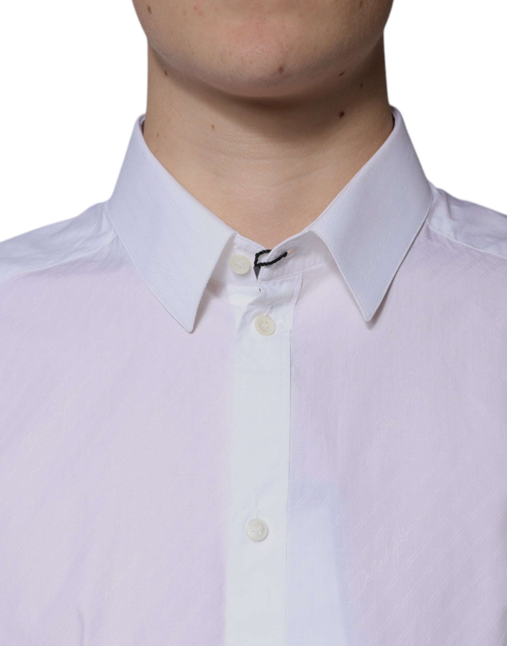 A mannequin wearing a white cotton long sleeve dress shirt with a collar