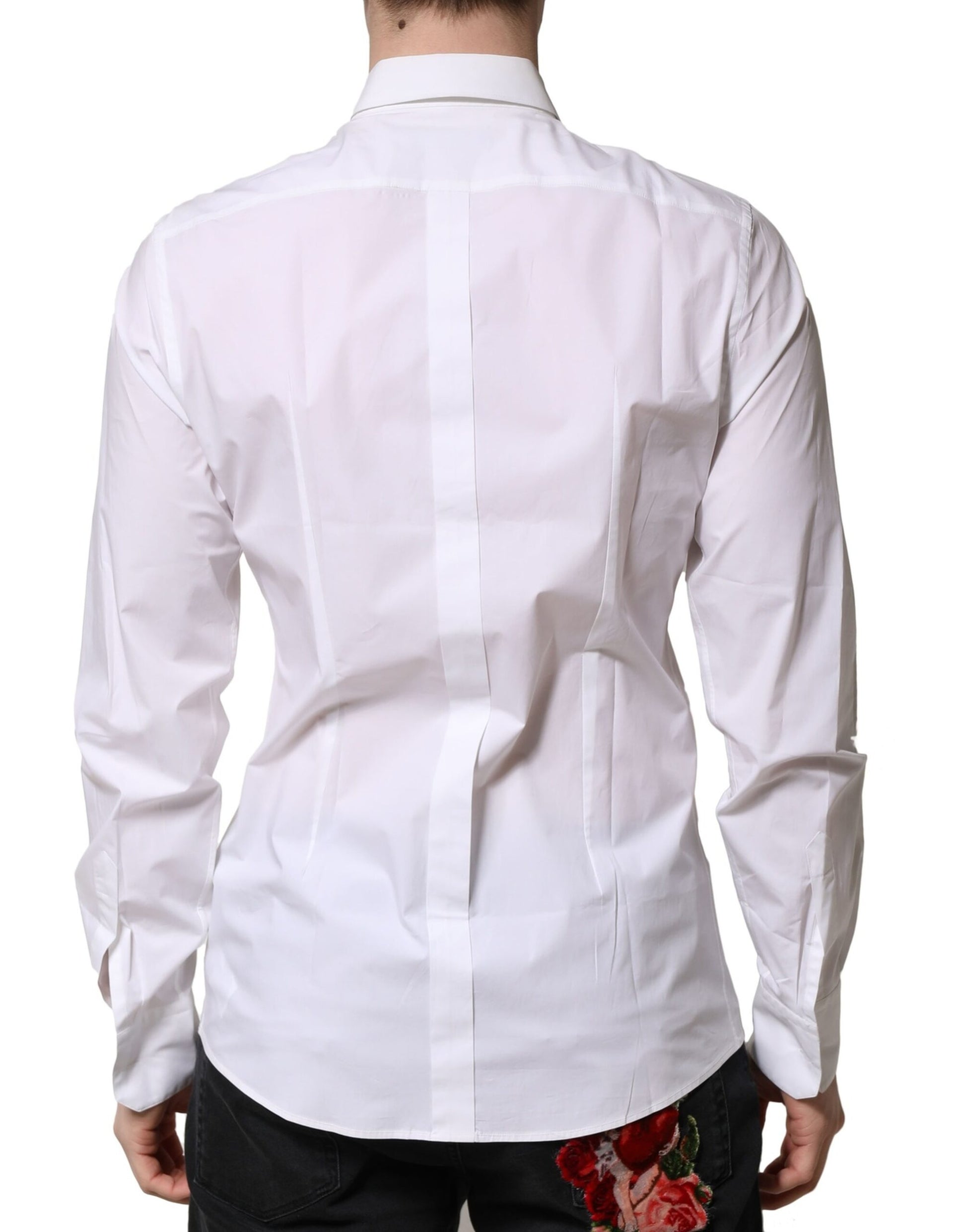 A white cotton long sleeve dress shirt with a button-up front