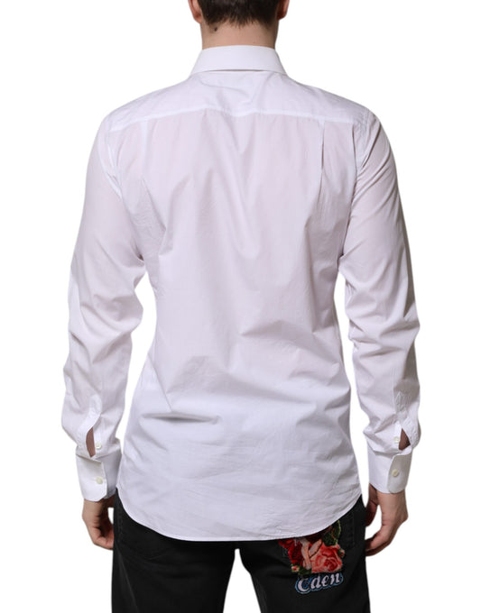 A long sleeve white cotton dress shirt with a collar and button-down front