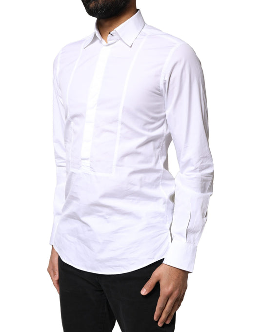 A long sleeve white cotton dress shirt with a collar and button-up front