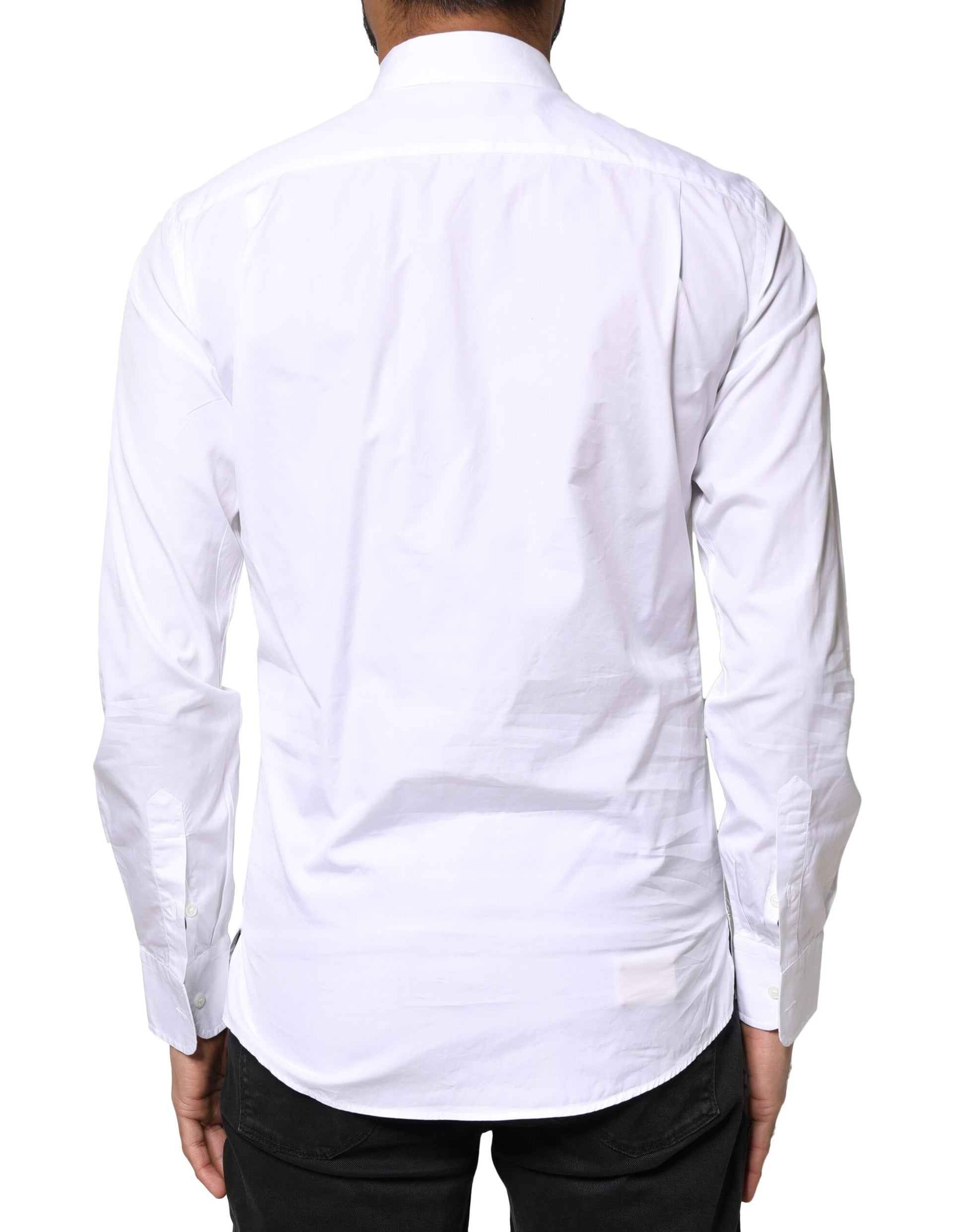 A long sleeve white cotton dress shirt with a collar and button-up front