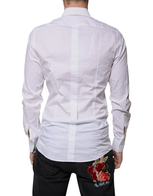 A white cotton long sleeve dress shirt with a gold design on the back