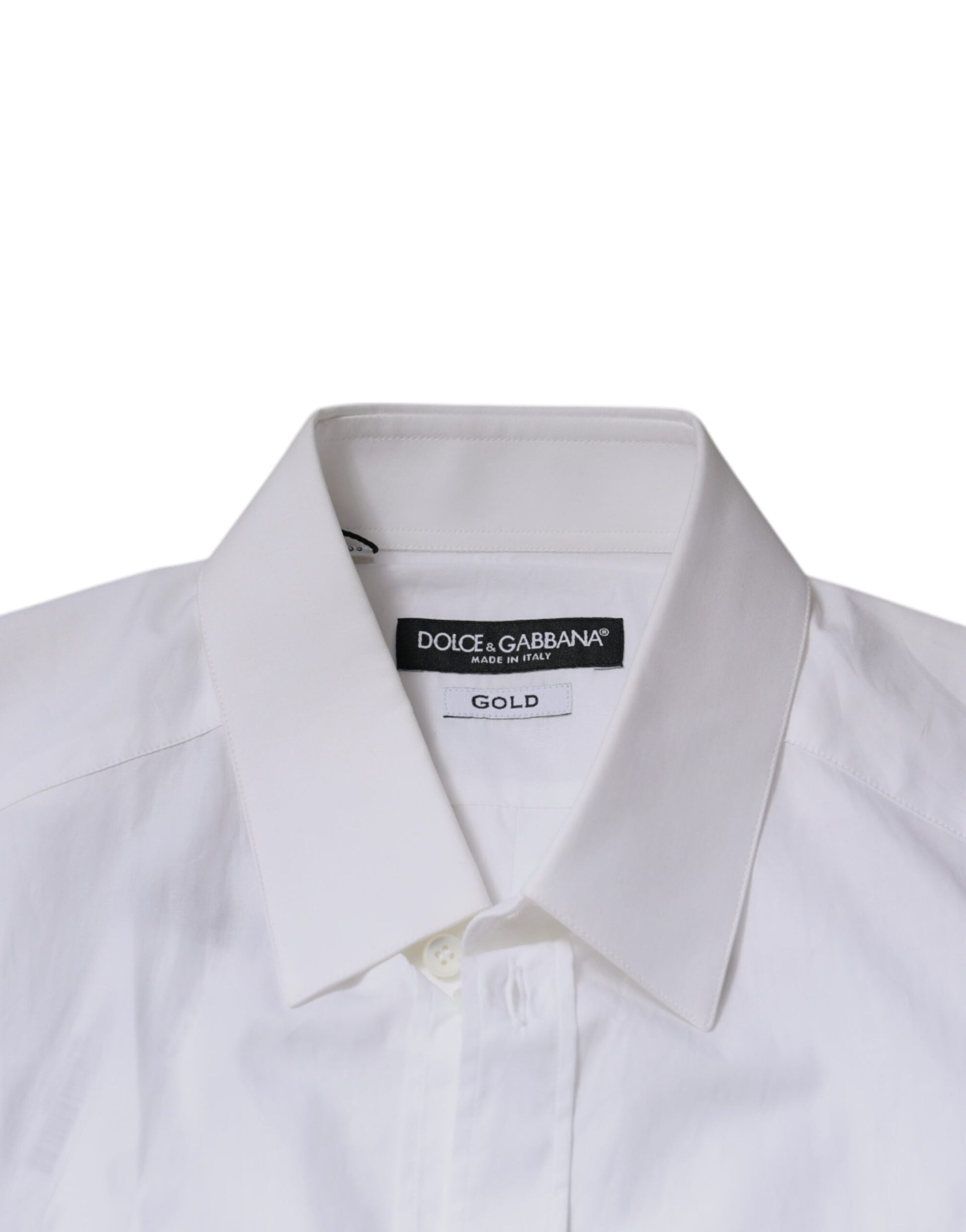A white cotton long sleeve dress shirt with a gold label on the collar