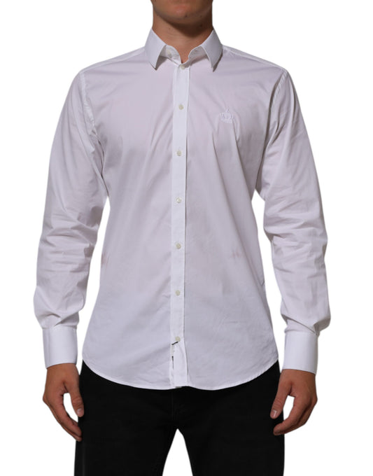 A white cotton dress shirt with long sleeves and collar, designed for formal wear