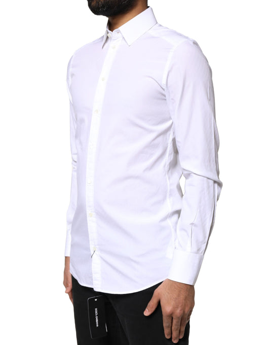 A white cotton dress shirt with a collar and long sleeves, designed for formal men's wear