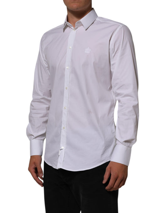 A white cotton dress shirt with long sleeves and a collar, designed for formal wear