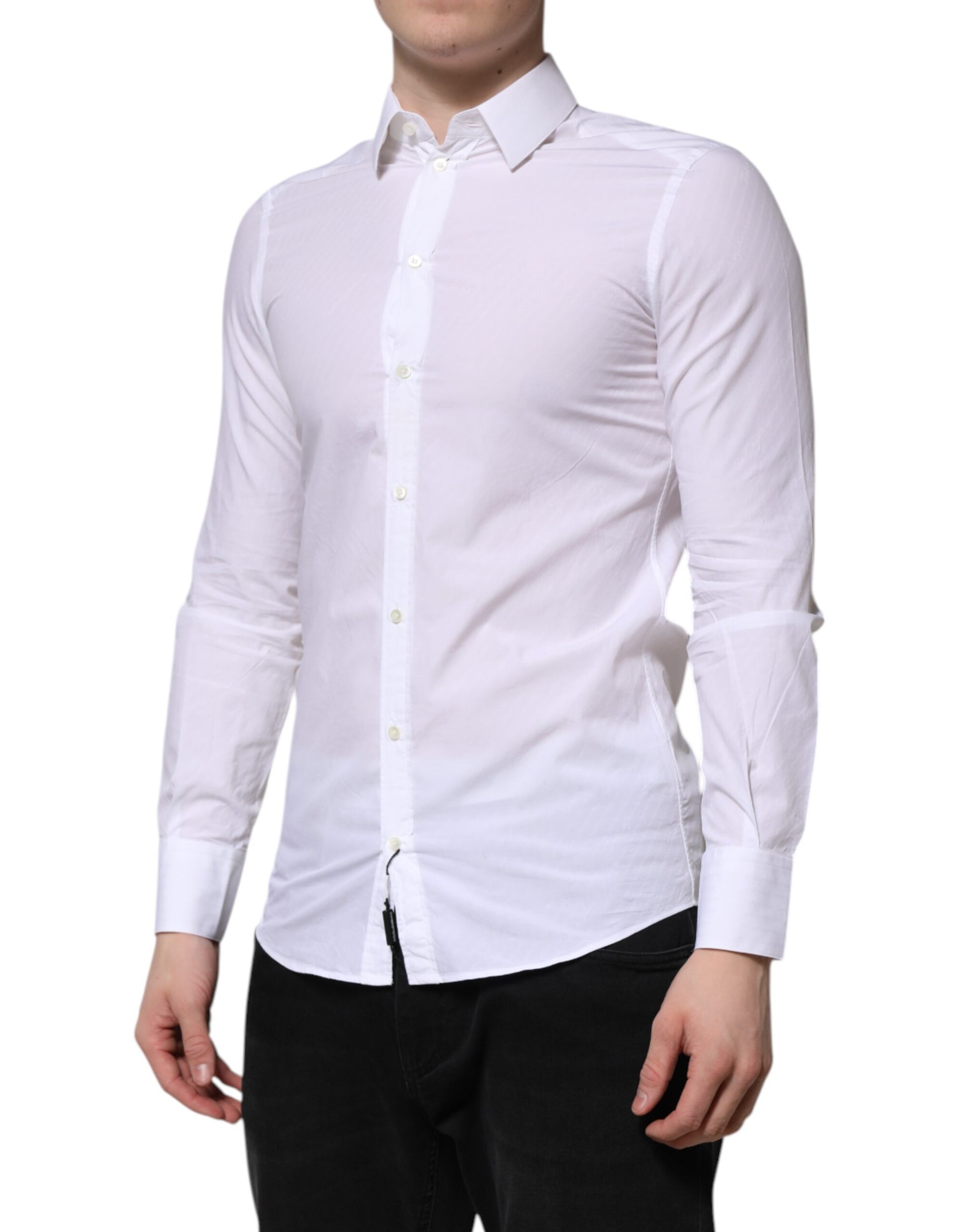 A long sleeved white cotton dress shirt with a collar and button-up front