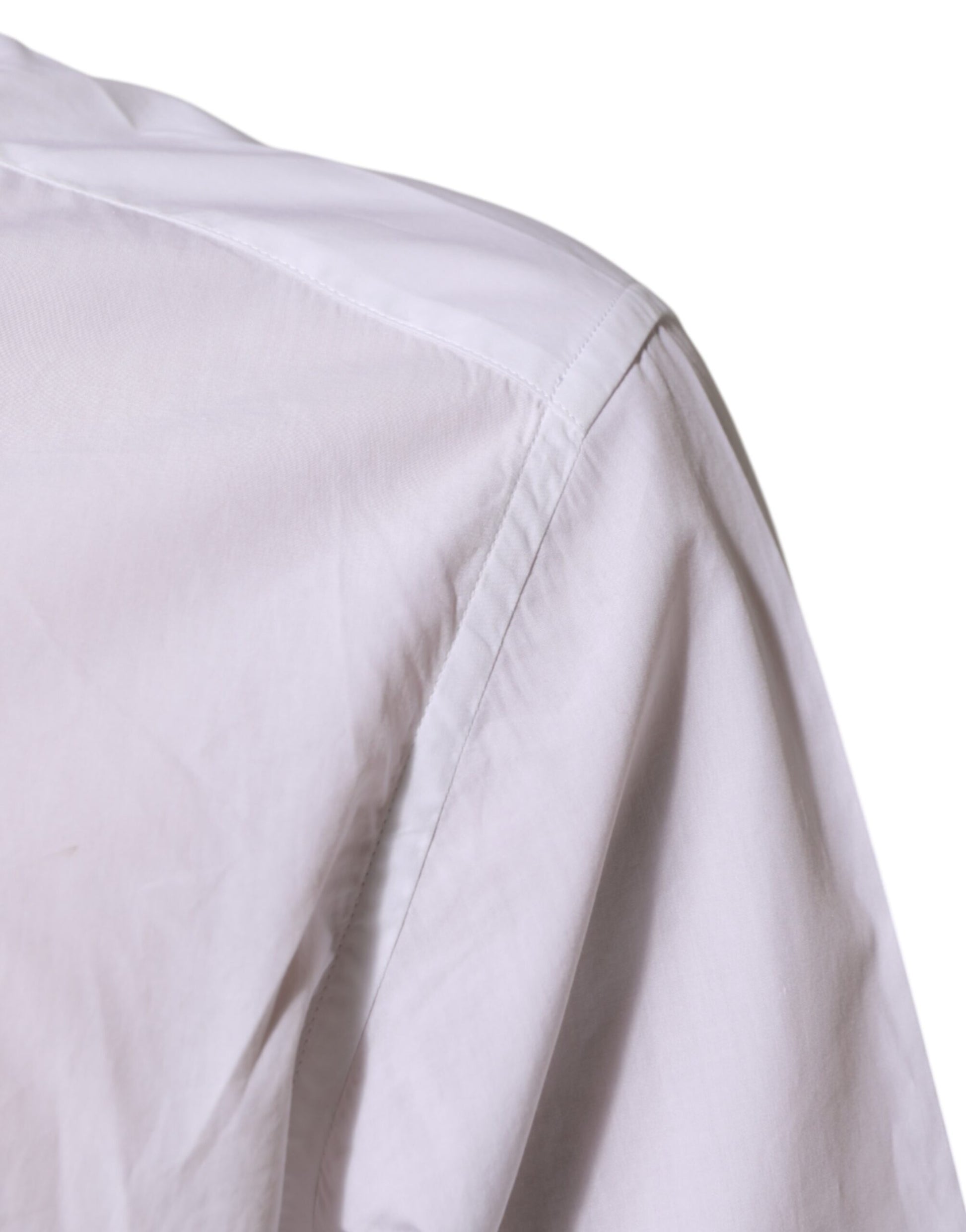 A white cotton dress shirt with a collar and sleeves, part of the Martini collection by Dolce & Gabbana