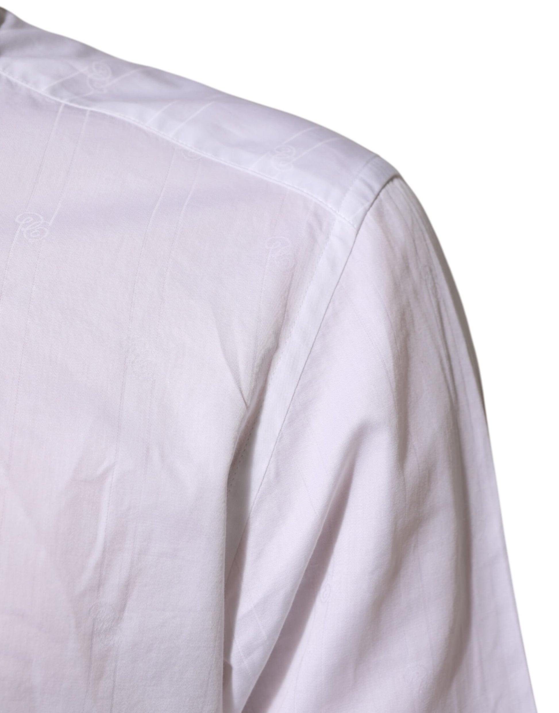 A white cotton men's formal dress shirt with a collar and short sleeves