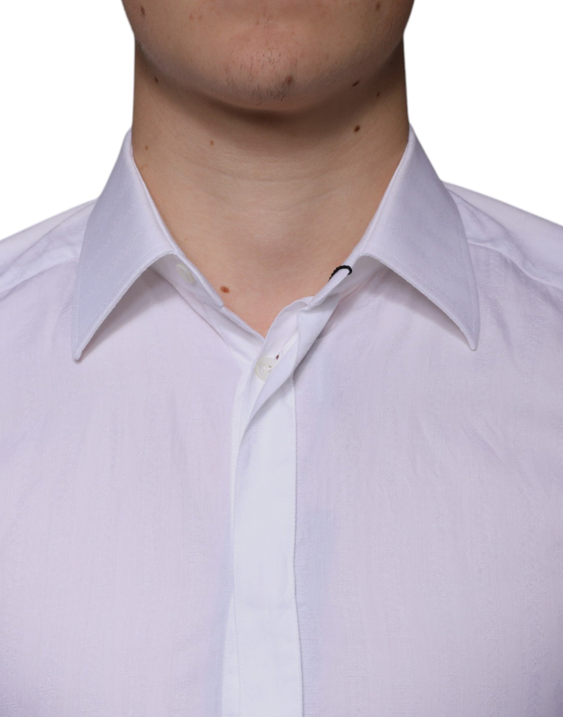 A white cotton men's dress shirt with a gold collar and cuffs