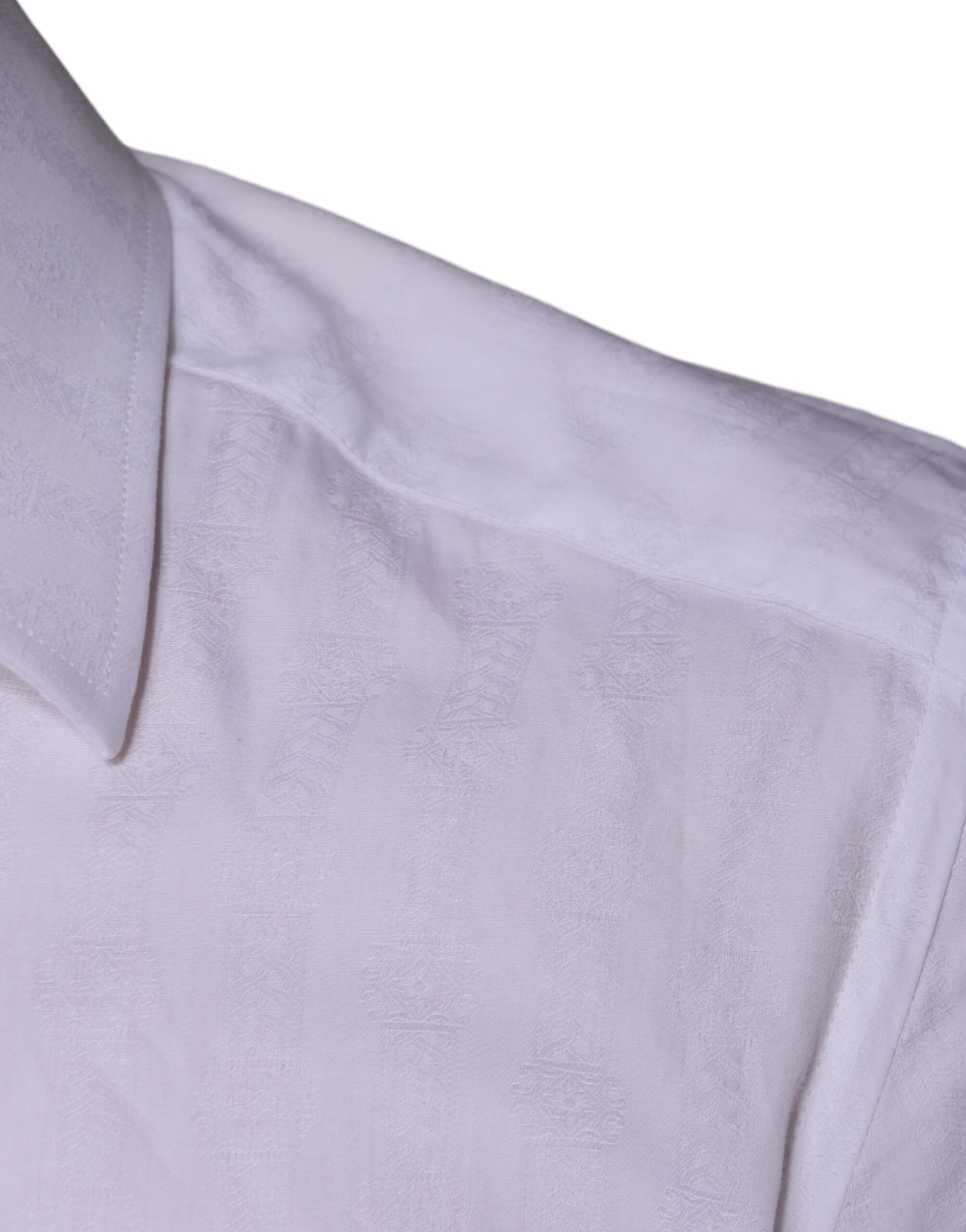 A white cotton men's dress shirt with a gold collar and cuffs