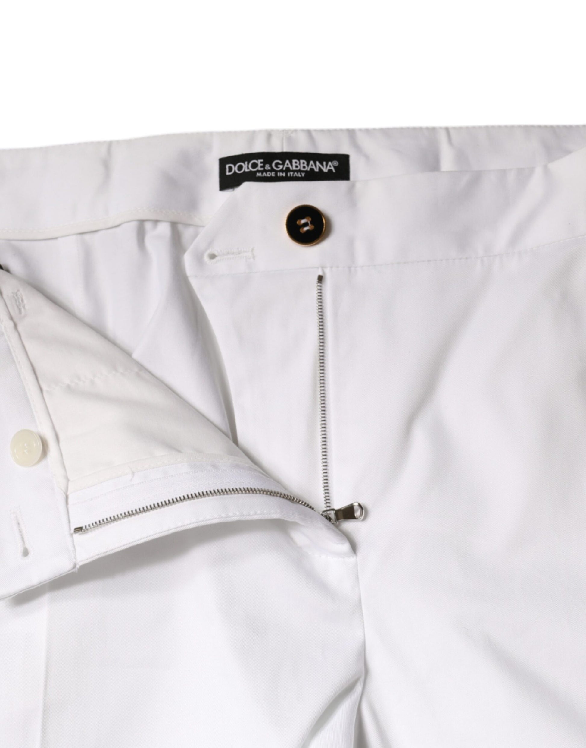 White pants with zippered pockets