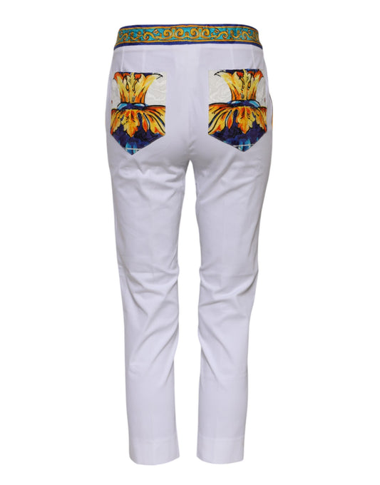 White pants with butterfly design on back