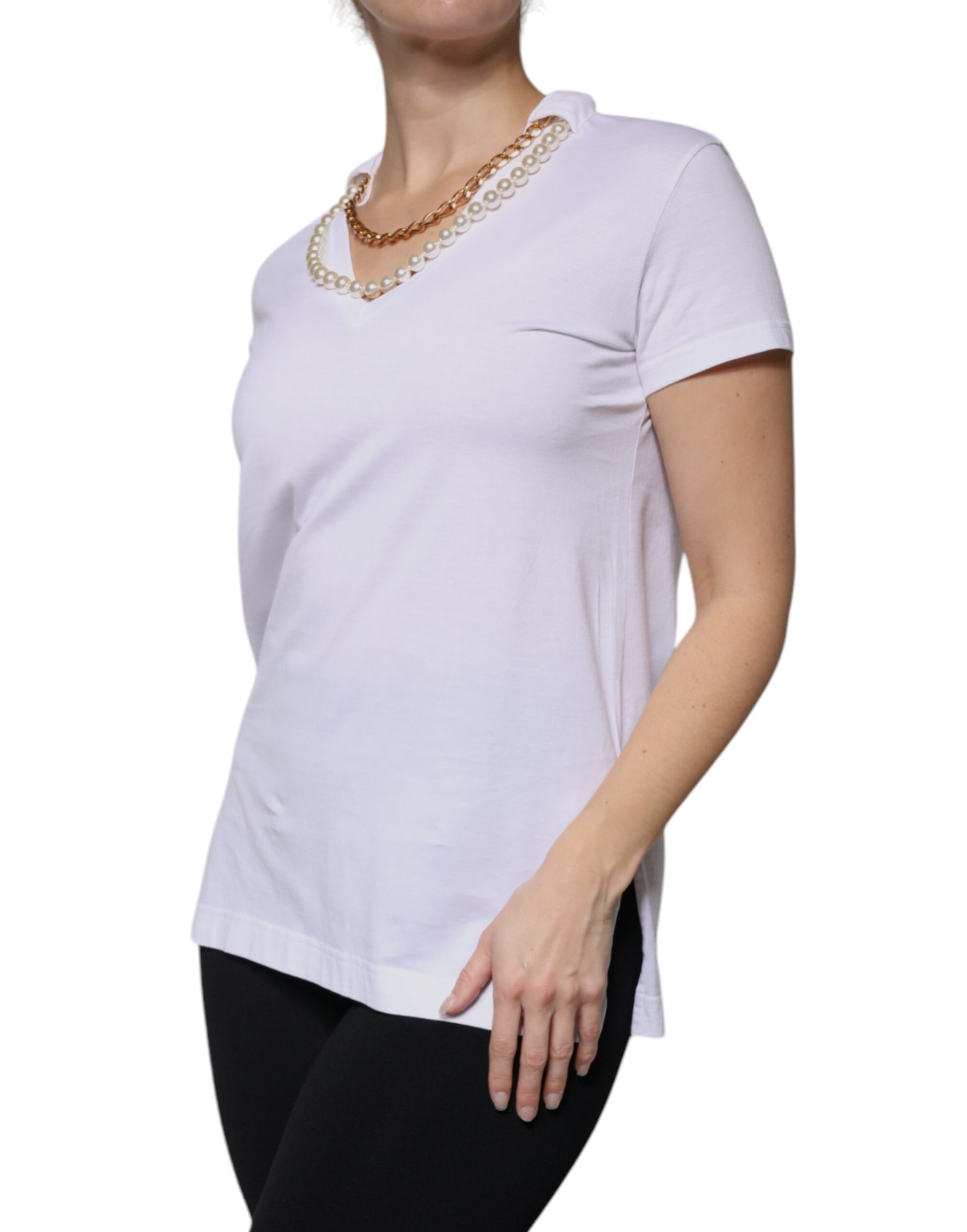 Woman wearing white top with ruffled sleeves