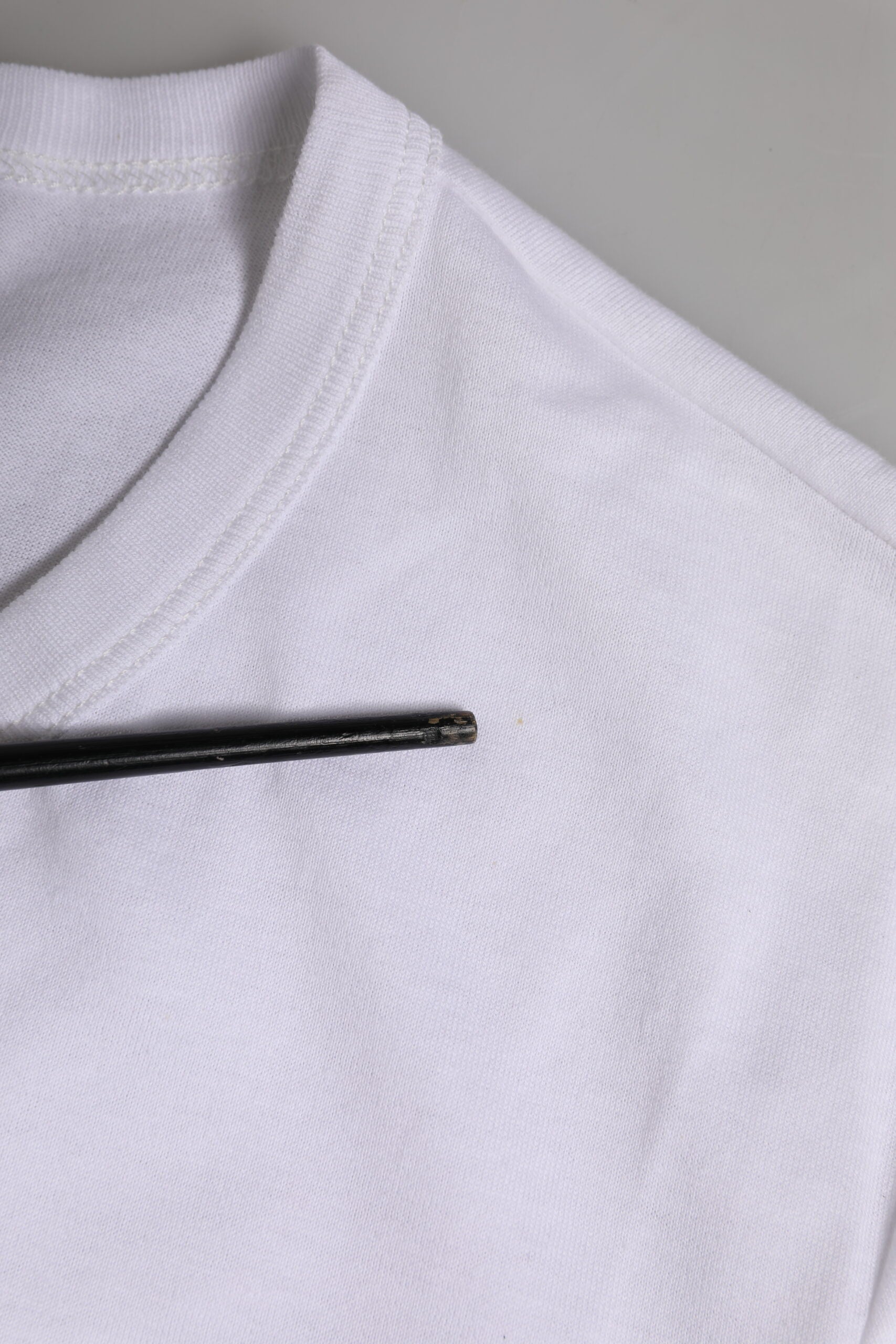 White t-shirt with black zipper