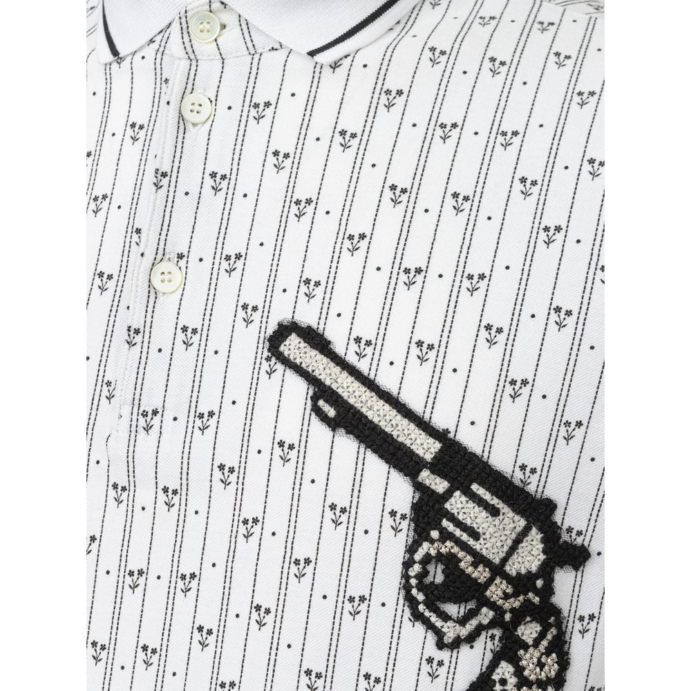 Shirt with embroidered gun design