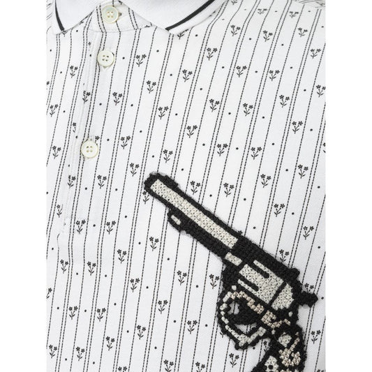 Shirt with embroidered gun design