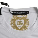 White t-shirt with gold heart logo on front