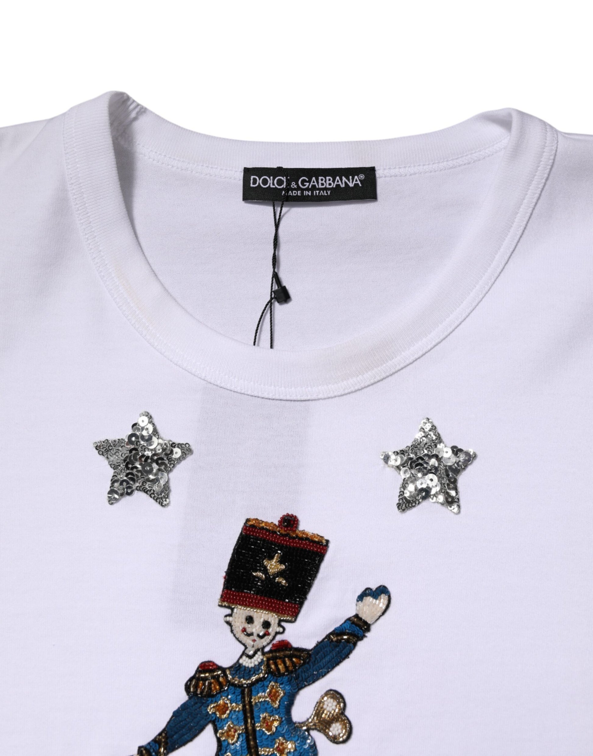 White t-shirt with a clown design on front