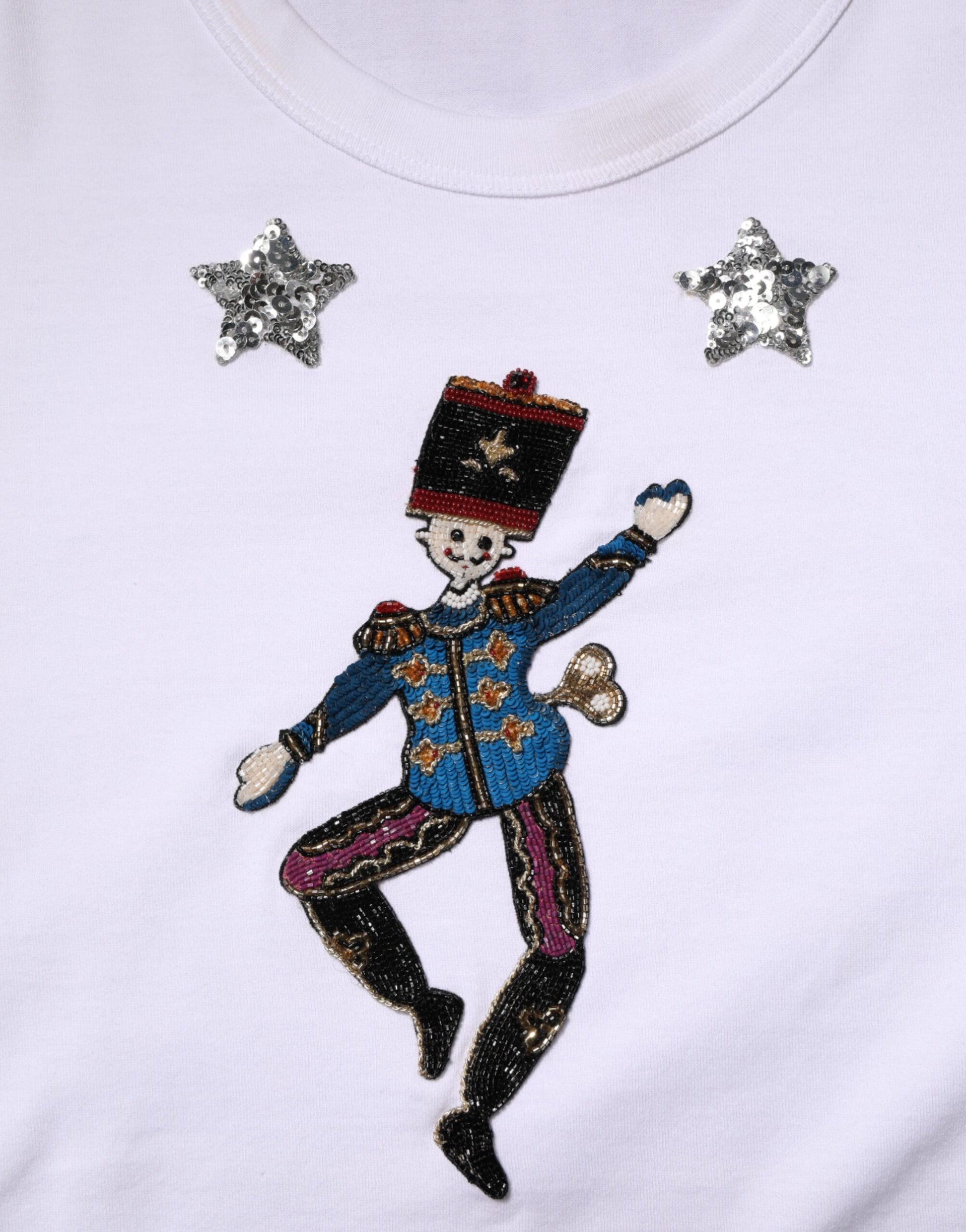 White shirt with embroidered clown dancing