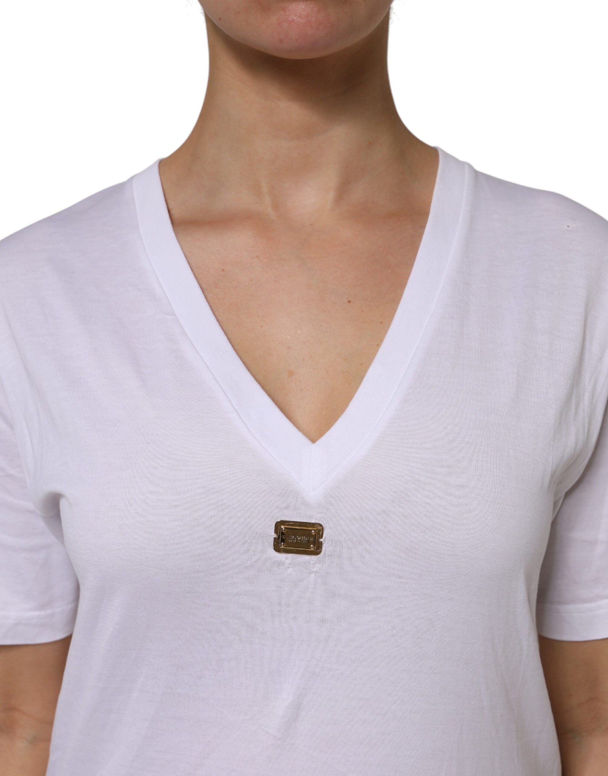 Woman wearing white v-neck shirt