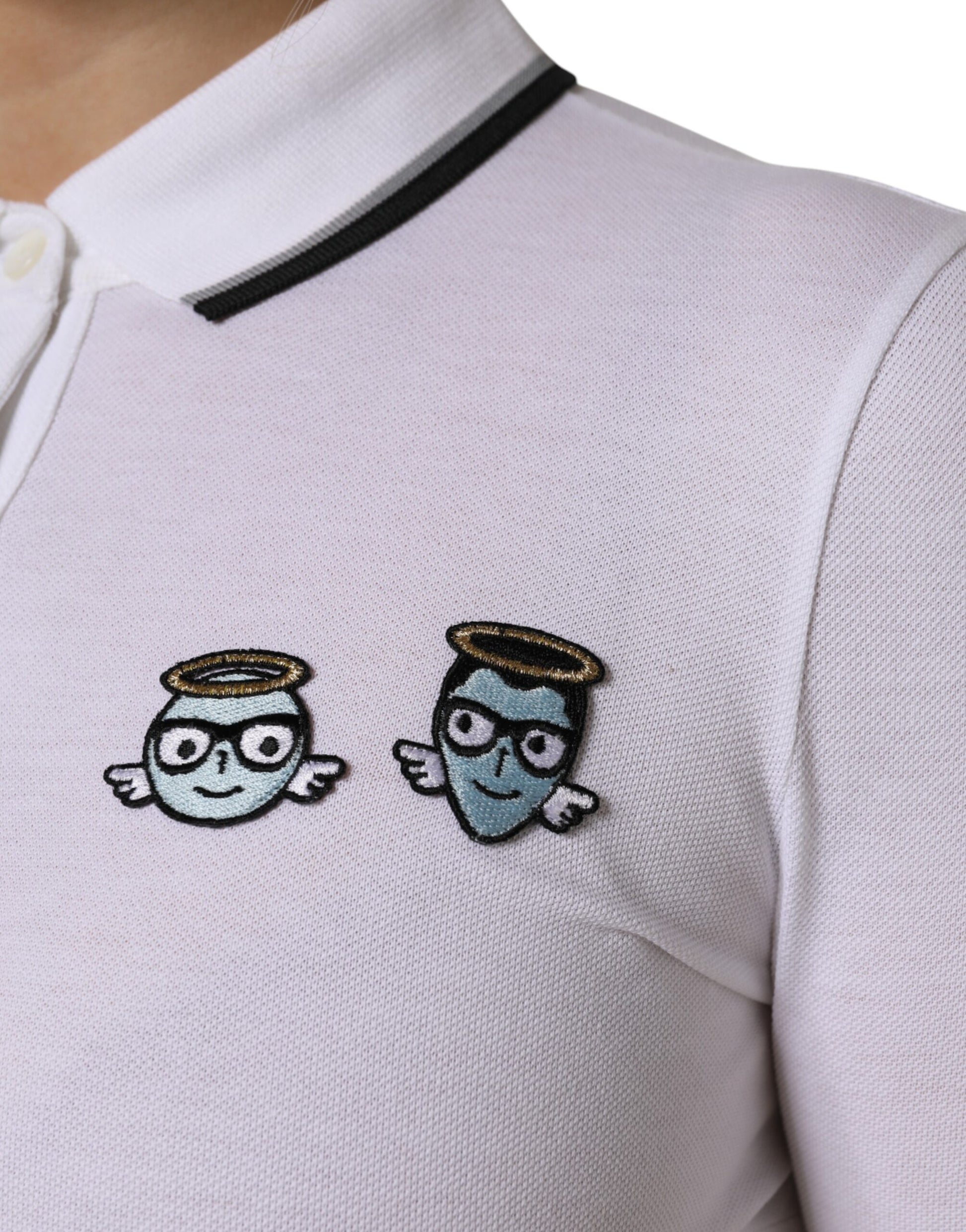 White polo shirt with two cartoon angels on sleeve