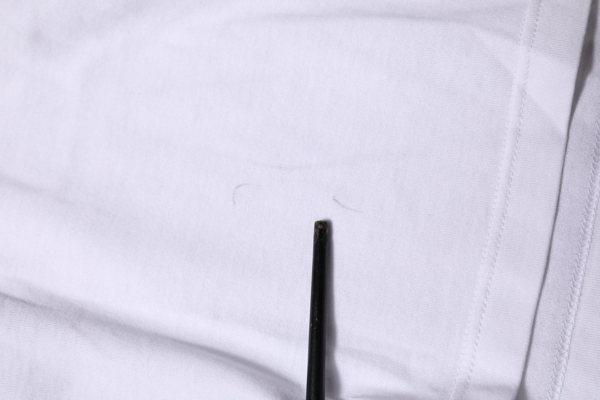 White shirt with buttonhole
