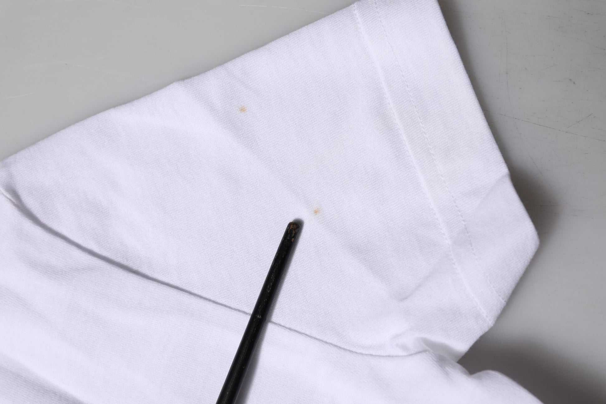White napkin with black pen on top
