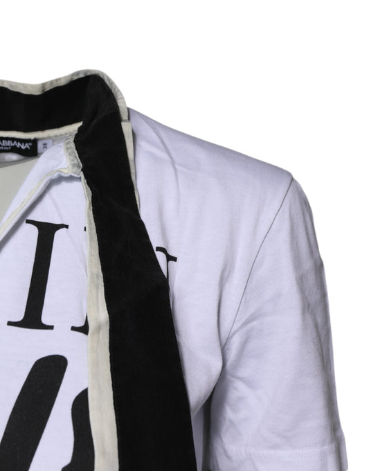 White jacket with black scarf hanging on a mannequin