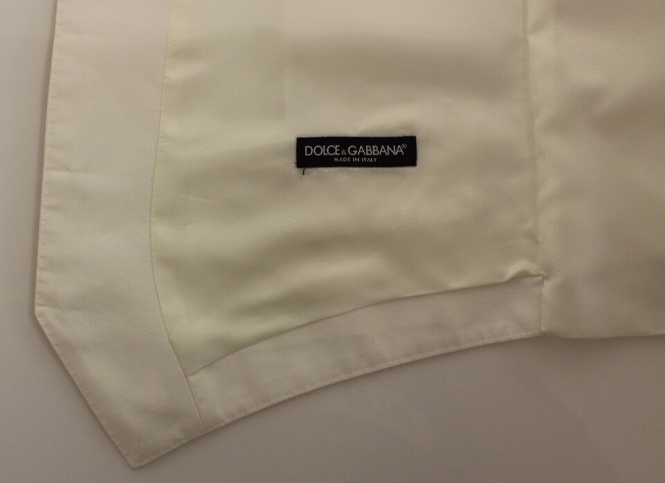 A white cotton silk blend vest from Dolce & Gabbana