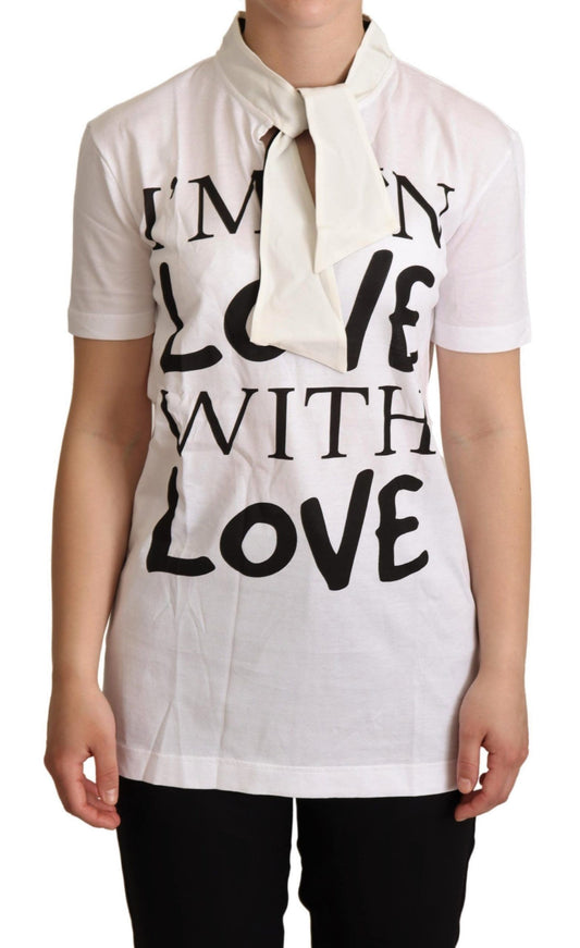 Woman wearing white t-shirt with black lettering