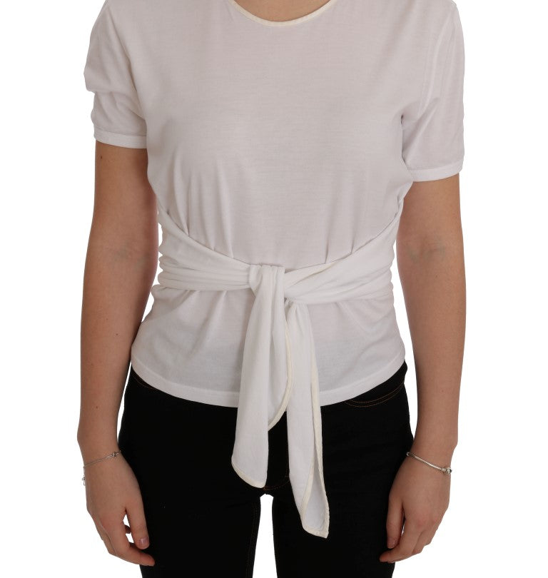 White sleeveless top with knot at waist