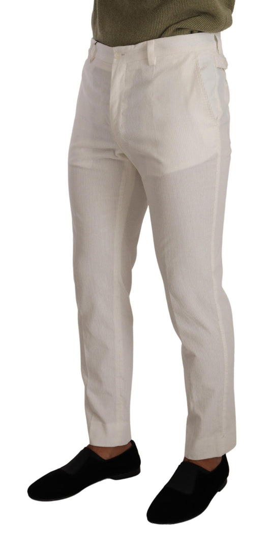 Mannequin wearing beige pants and black shoes