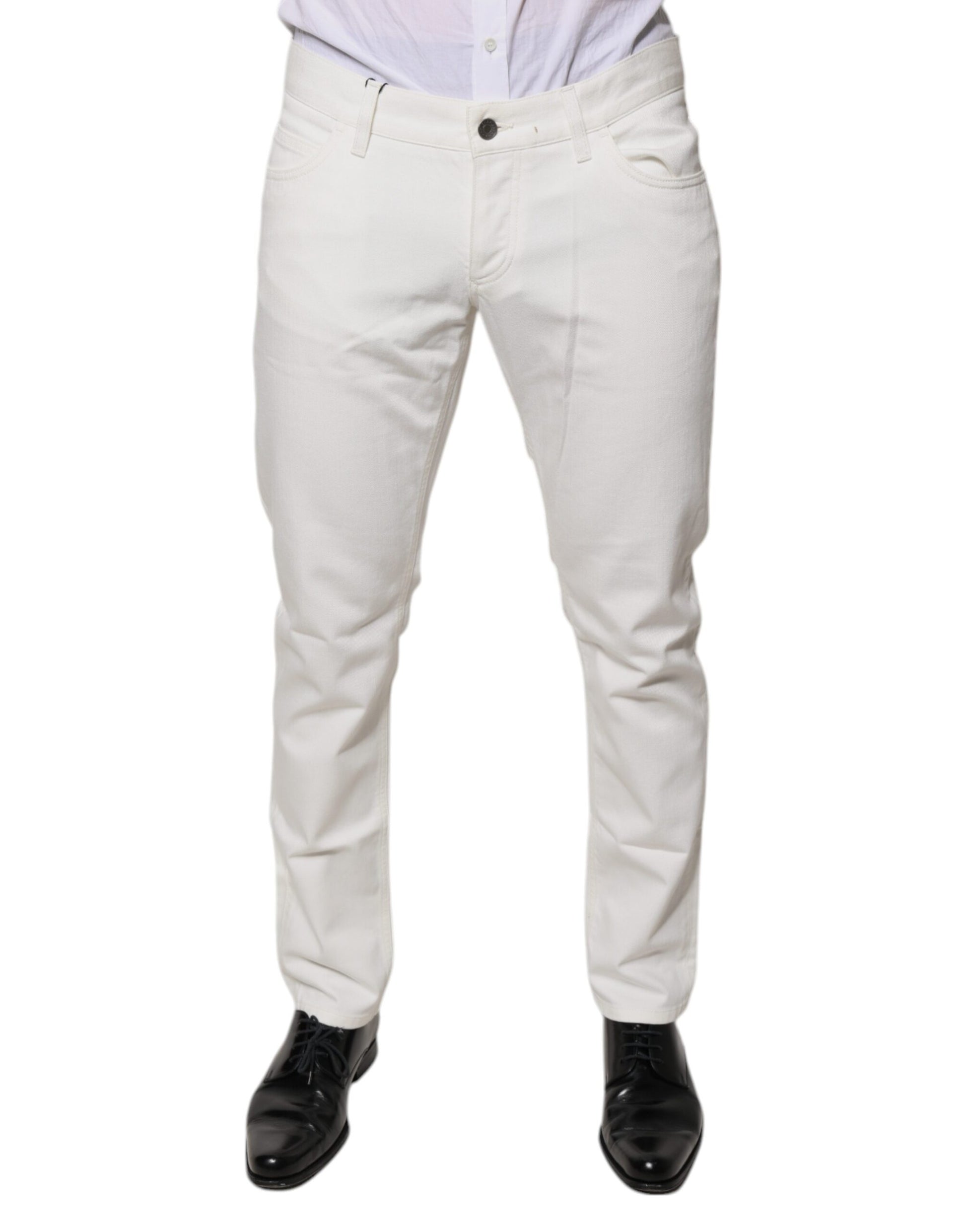 Mannequin wearing white pants and black shoes