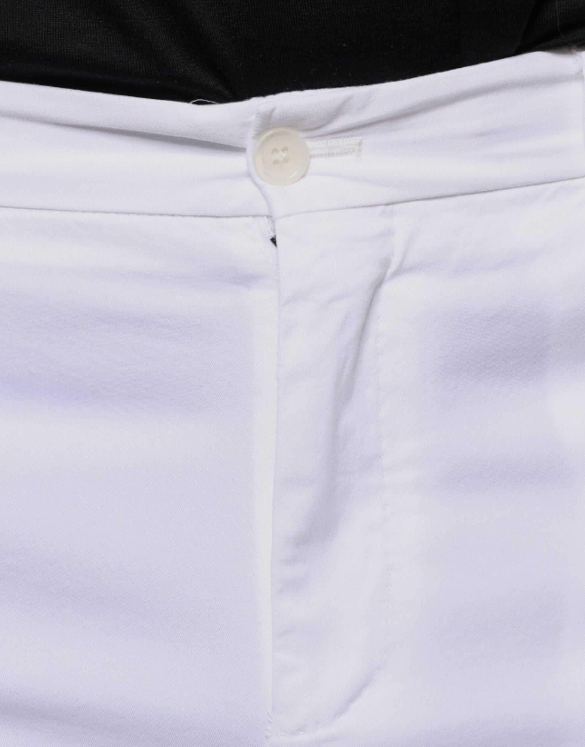 White cotton skinny dress pants with button closure, from Dolce & Gabbana collection