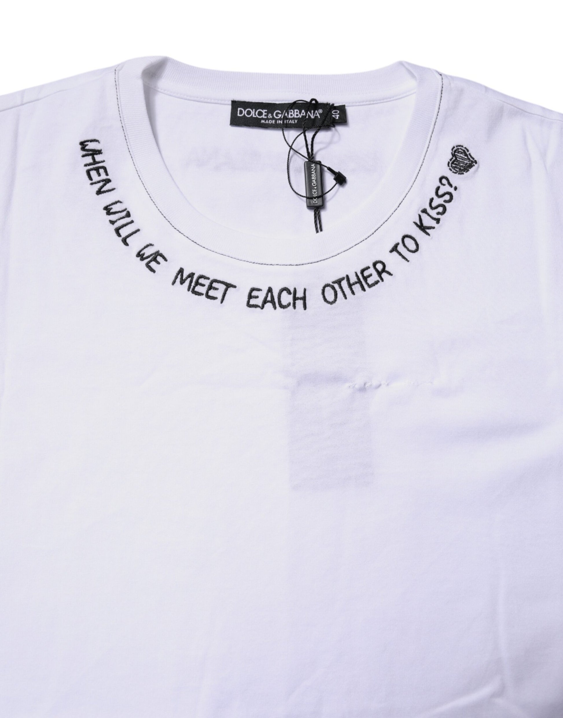 White t-shirt with handwritten style text on front