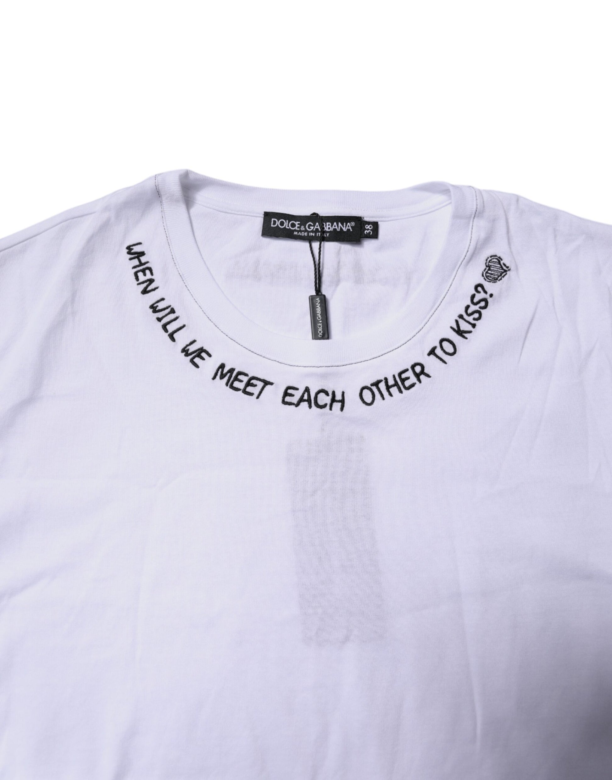 White t-shirt with handwritten style text on front
