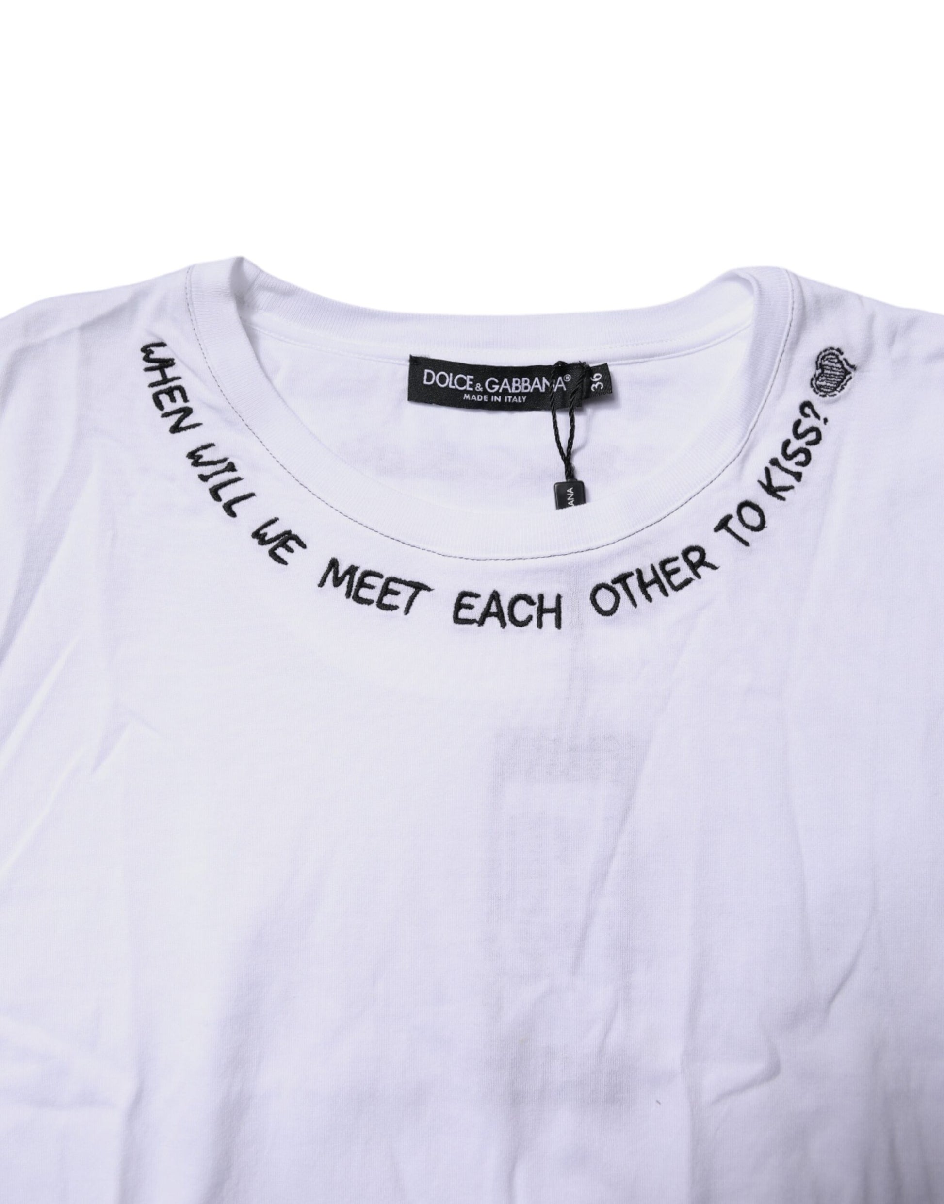 White t-shirt with handwritten style text on front