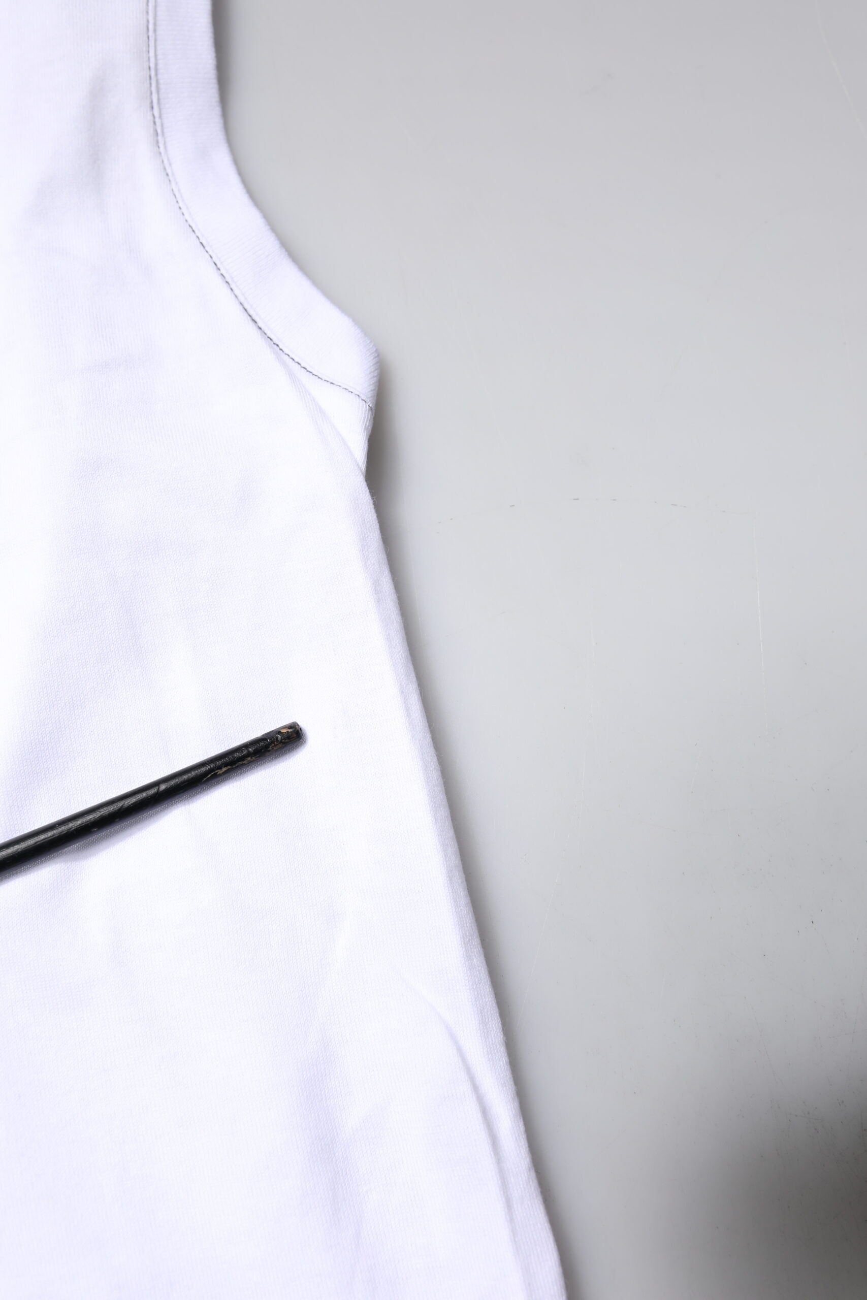 White t-shirt on table