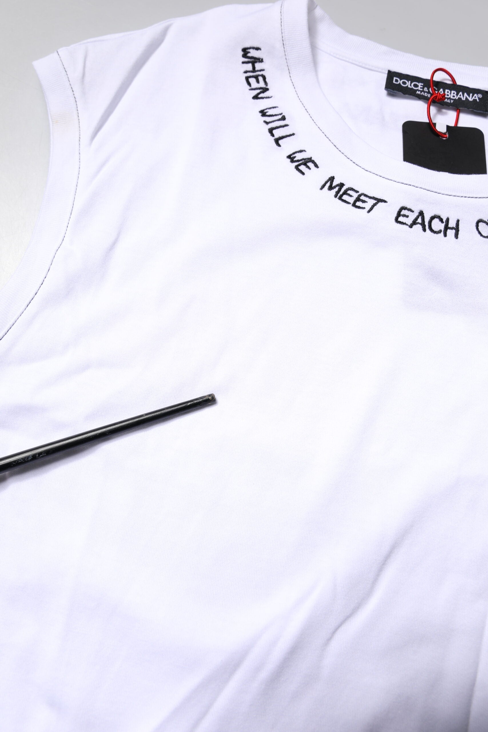 White t-shirt with printed message on front